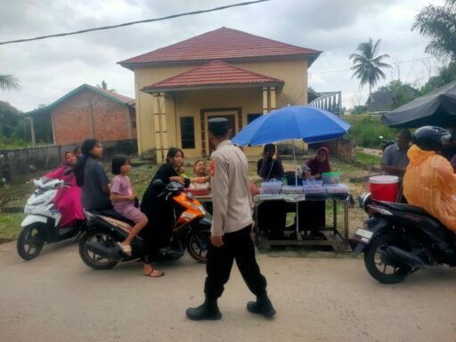 Polsek Rantau Alai Gelar Patroli Pasar Beduk untuk Jaga Keamanan dan Kenyamanan Masyarakat