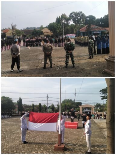 Polsek Ngimbang Ikuti Kegiatan Upacara Bendera Hari Pendidikan Nasional Di Lapangan UPT Ngimbang