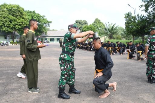 Korem 044/Gapo Kukuhkan Kenaikan Tingkat Pesilat Militer