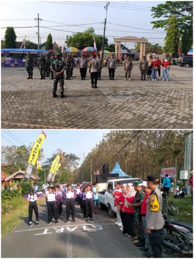 Polsek Ngimbang Gelar Pengamanan PemberangkatanPeserta Gerak Jalan Tingkat SD / MI / Se
