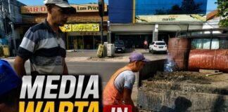 Bersihkan selokan air pegawai PU ngunut