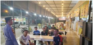 Polsek Ngimbang Menggelar Kegiatan NOBAR Piala Dunia Tahun 2026 Antara Spayol Vs Tanjung Verde