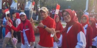 Sambut HUT Kemerdekaan RI ke 81 , Pemprop NTB Bagikan Ribuan Bendera Merah Putih Kepada Masyarakat