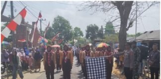 Polsek Ngimbang Gelar Pengamanan Gerak Jalan Tingkat SMP, SMA Sederajat / Umum Putri Tahun 2026